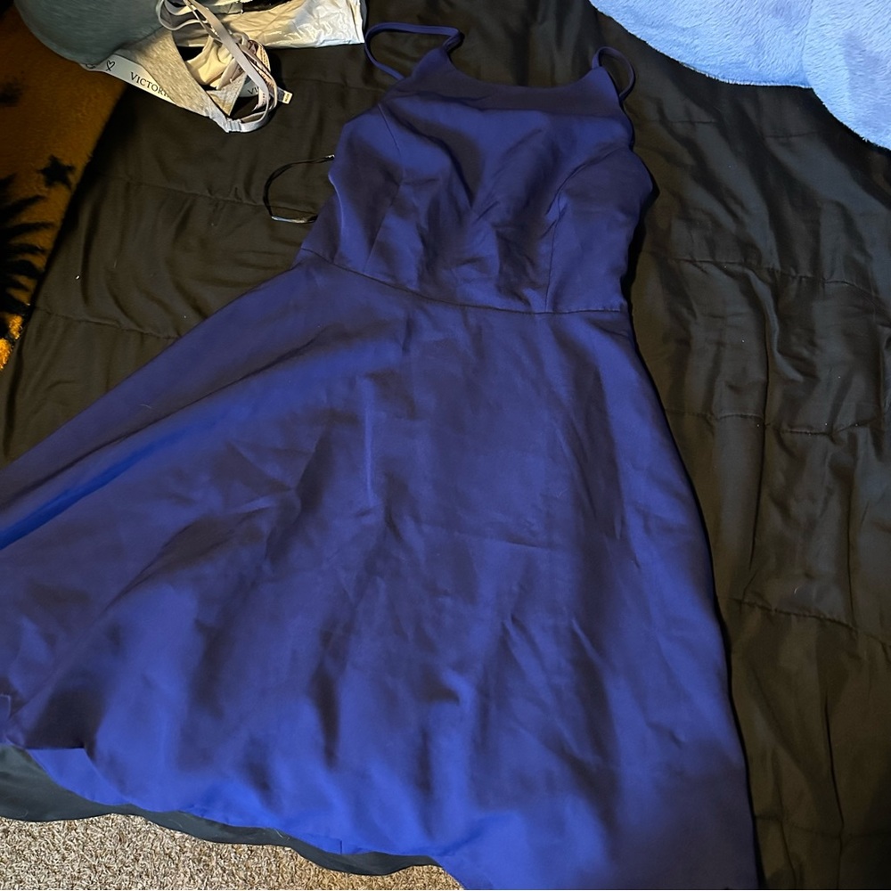 Lulus size small navy blue dress. Halter like top and open tie back.